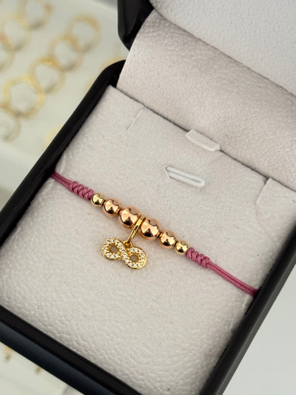 Pulsera infinito circonia oro rosa